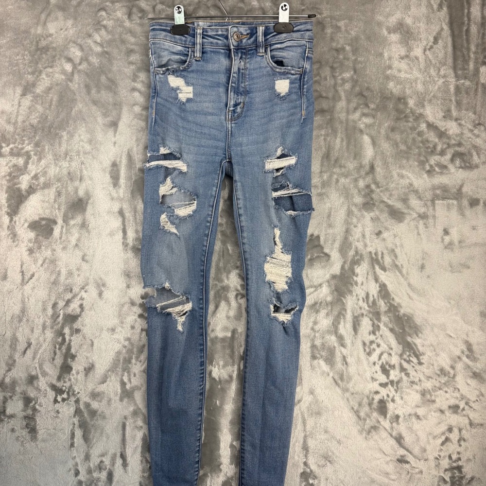 American Eagle Super Hi-Rise Jegging Distressed Blue Jeans Next Level Stretch 0